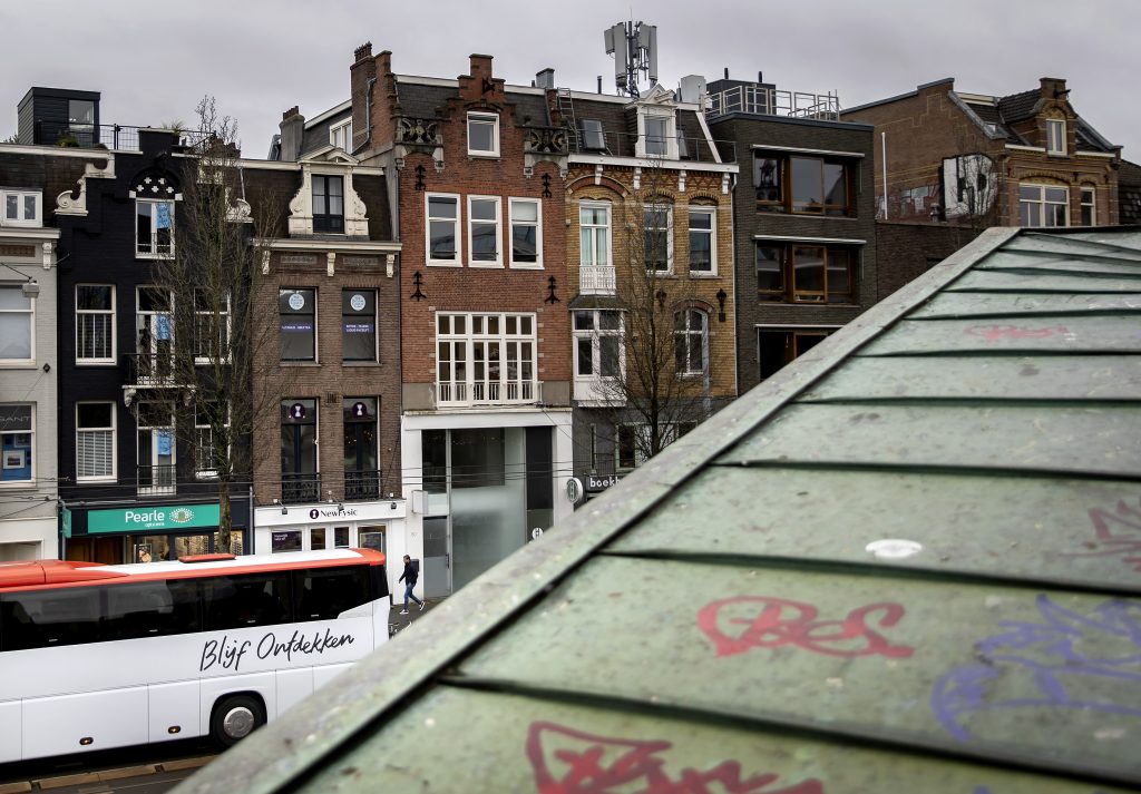 ANP - Touringcar in Amsterdam